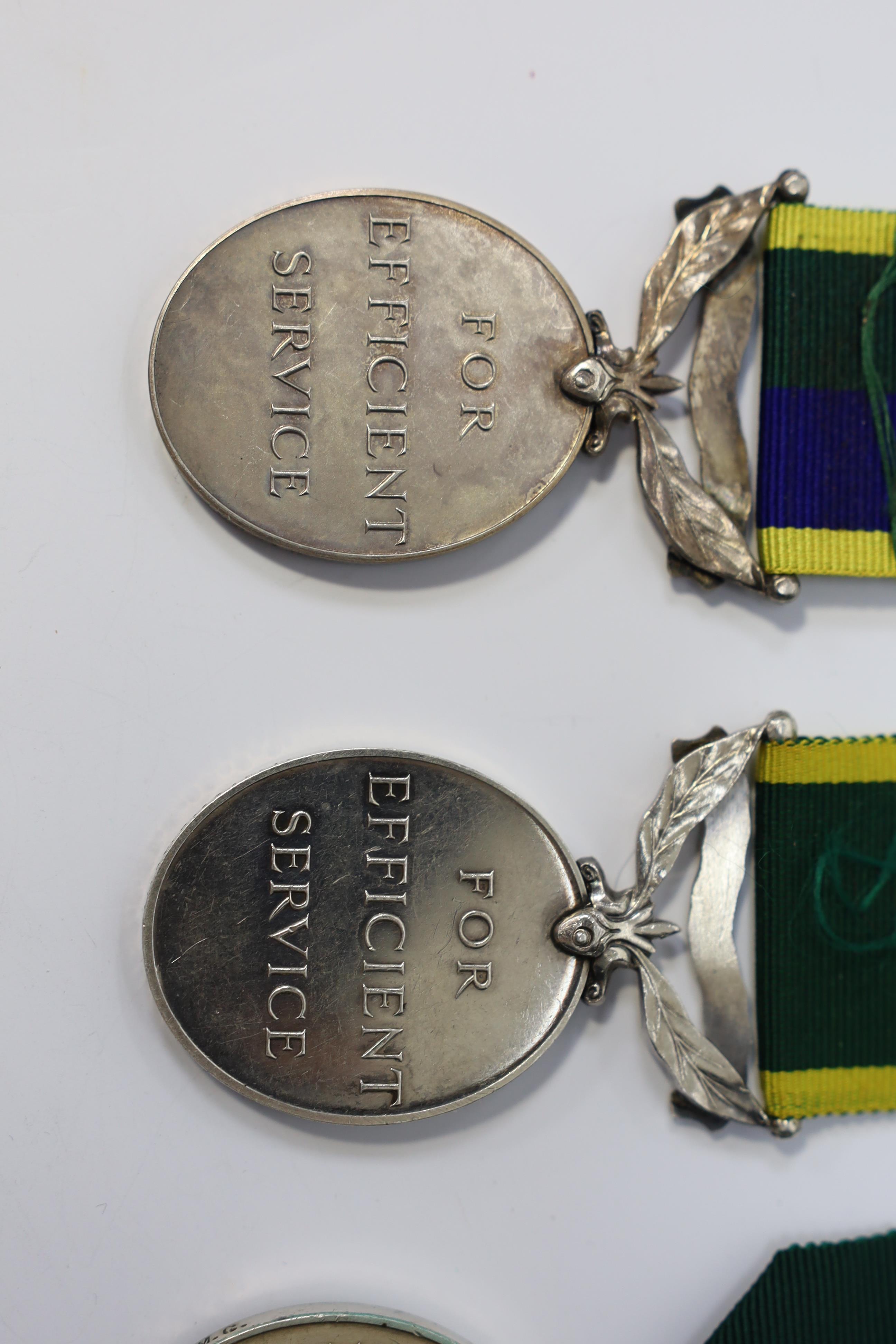 Six assorted Efficiency medals; GV (C) India to Pte.F.S.Slee,1 E.I.RY.R.,A.F.I.;GV (A) Territorial to 477046 Sjt H.W.Pawley, R.A.M.C.; GVI Militia to 2313197 Sclmn.S.H.Dummer, R.Signals.; GVI Territorial to 1434970 Gnr C